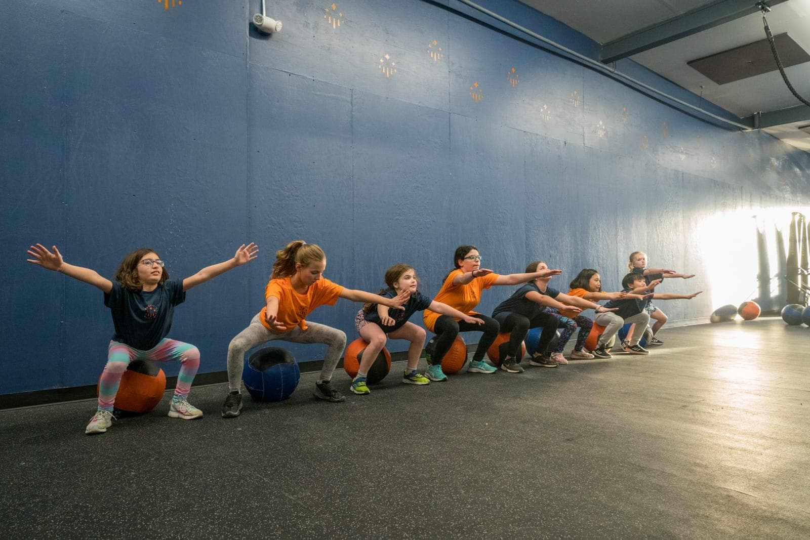 Young athletes training in a CrossFit Youth class