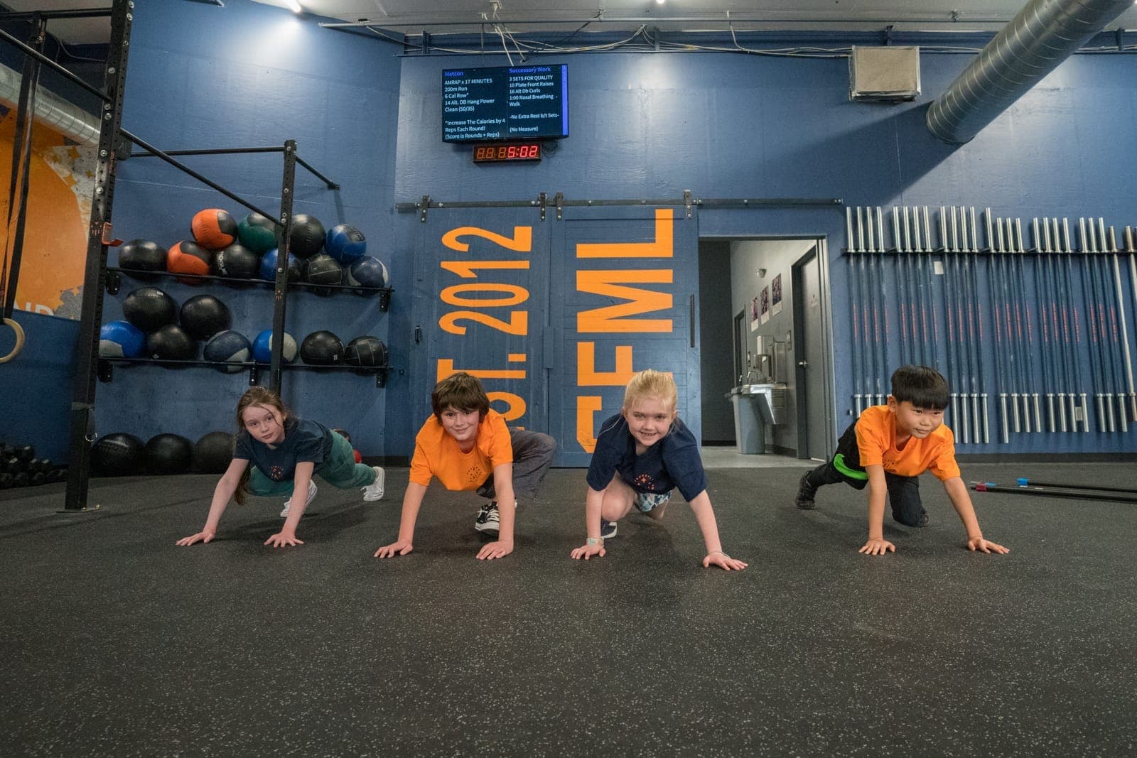 Young athletes training in a CrossFit Youth class